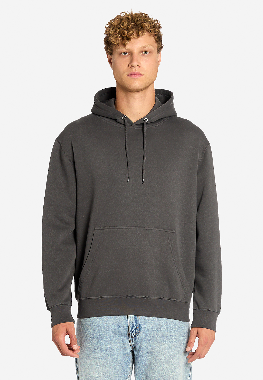 Black premium pullover hoodie by Varaprint with a soft fabric texture and a cozy fit, shown in a close-up view.