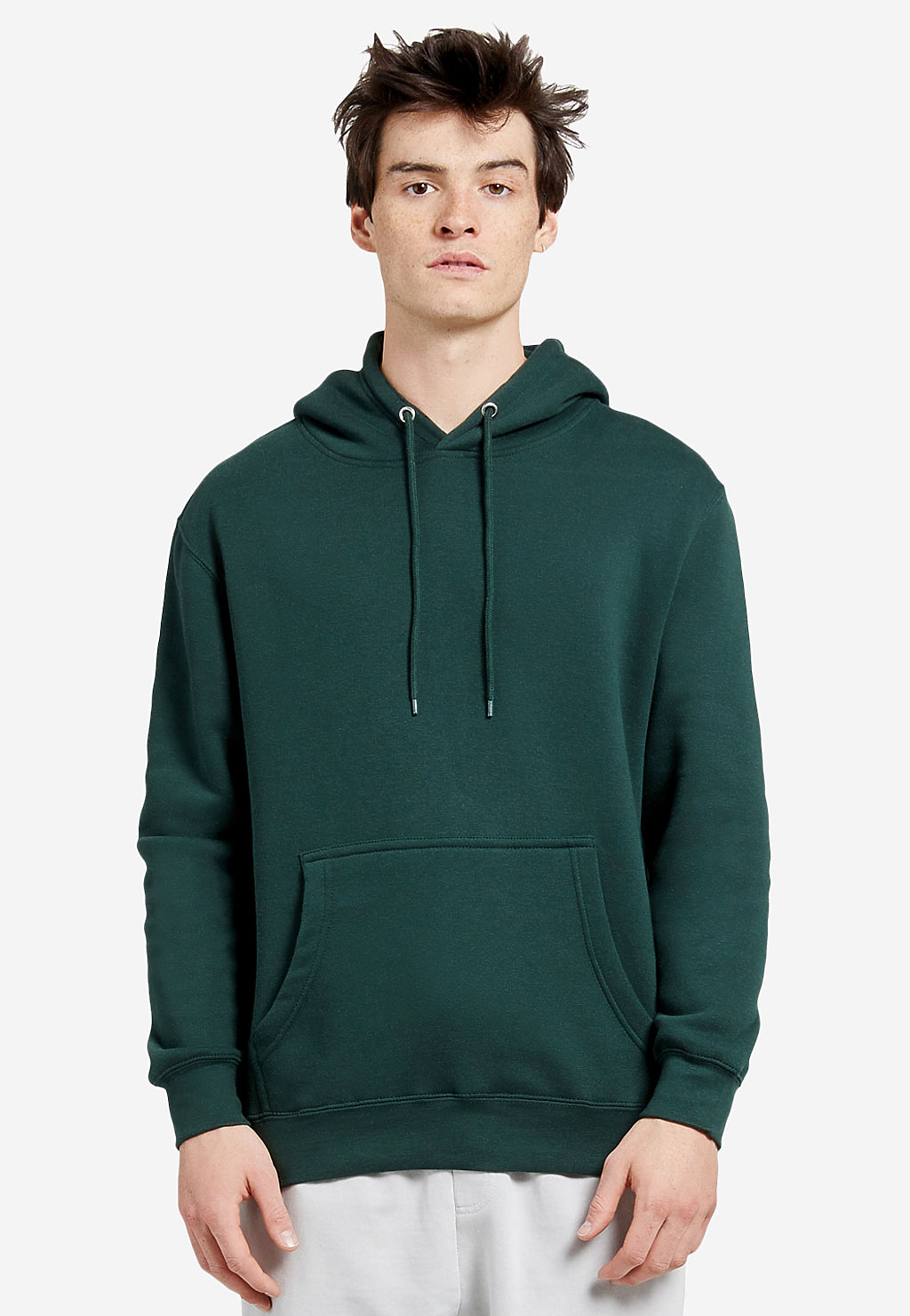 Varaprint premium pullover hoodie in dark green, showing a close-up of the soft fabric and relaxed fit.