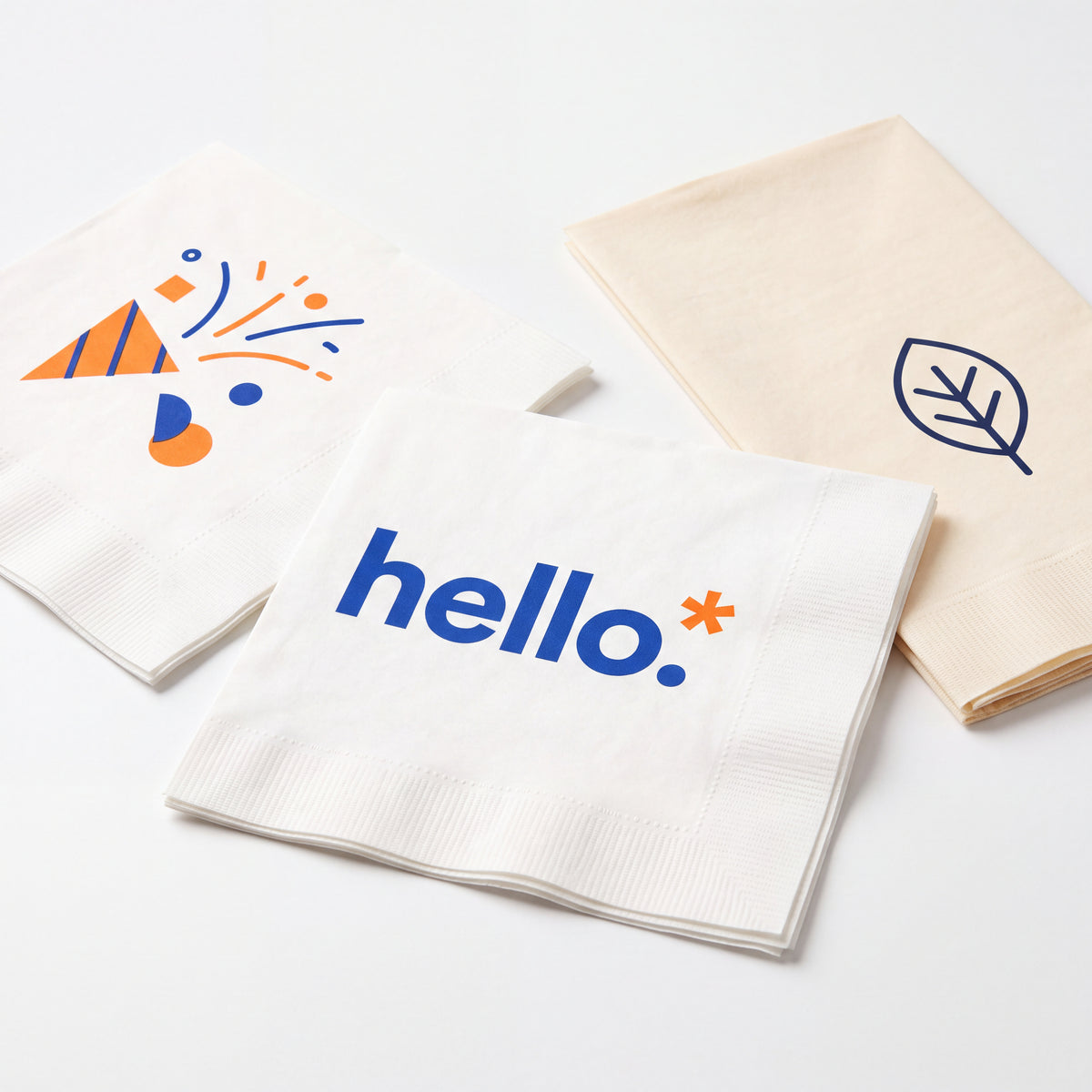 Custom printed white and ecru paper napkins with blue and orange sample designs.
